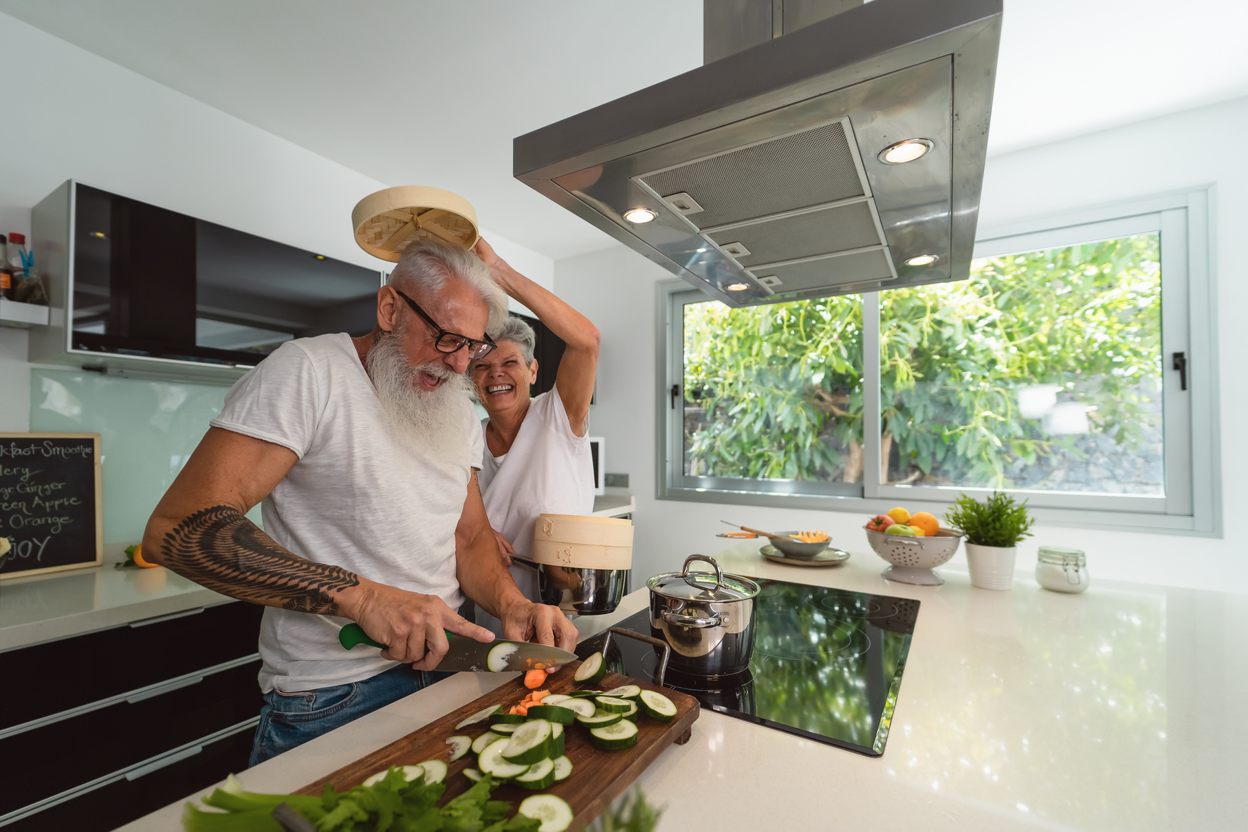  Senior Couple Having Fun Cooking Together at Home