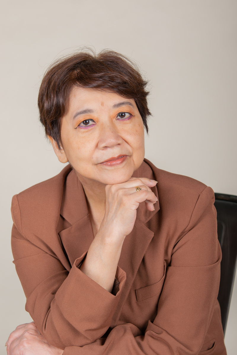 Portrait of a Middle Aged Woman in Brown Coat