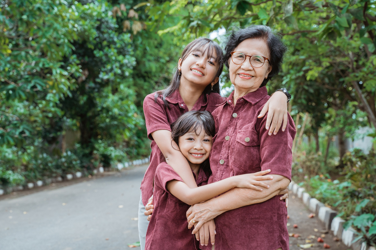 Togetherness of Grandma with Two Granddaughter Having Fun